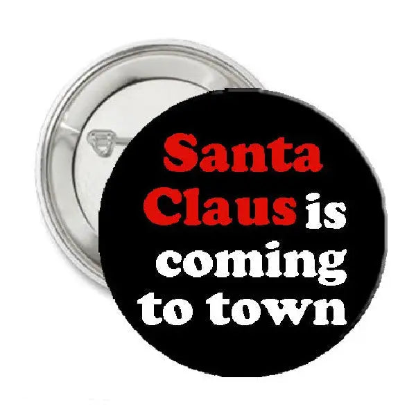Round black pinback button with "Santa Claus is coming to town" text in red and white