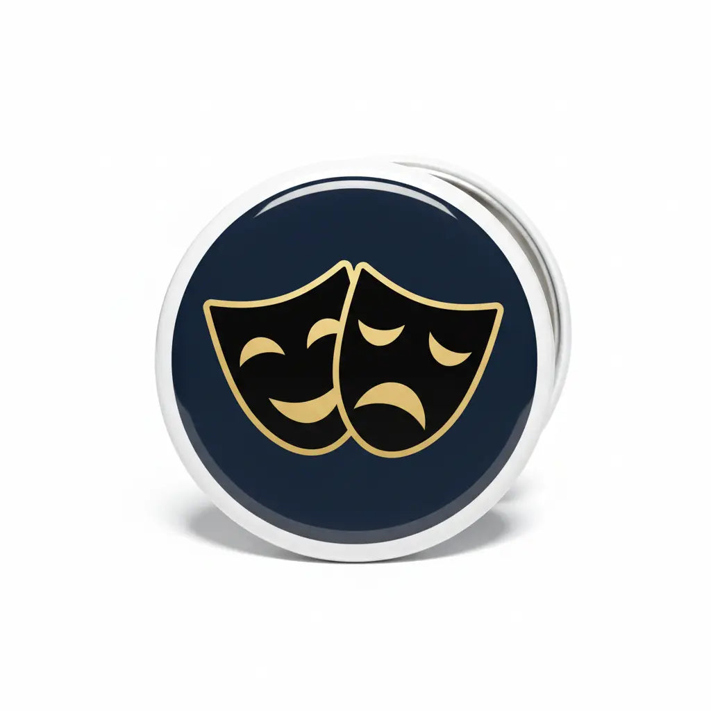 2.25-inch circular pinback badge with navy face and gold comedy/tragedy masks, silver border