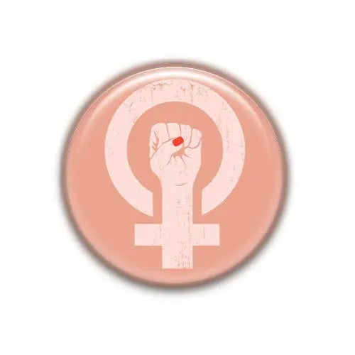 Round pink Girl Power magnet with raised female symbol and small red heart eye