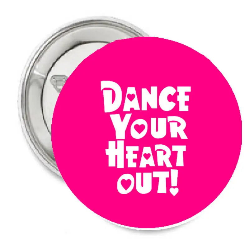 1.25-inch pinback button with pink face and white "Dance Your Heart Out!" text