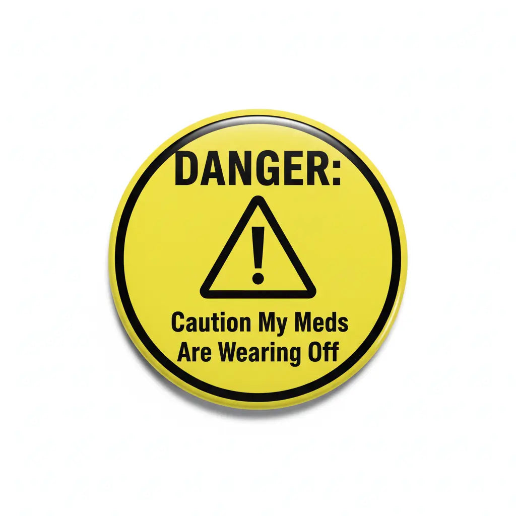2.25-inch pinback button with yellow warning design, DANGER text, and caution message