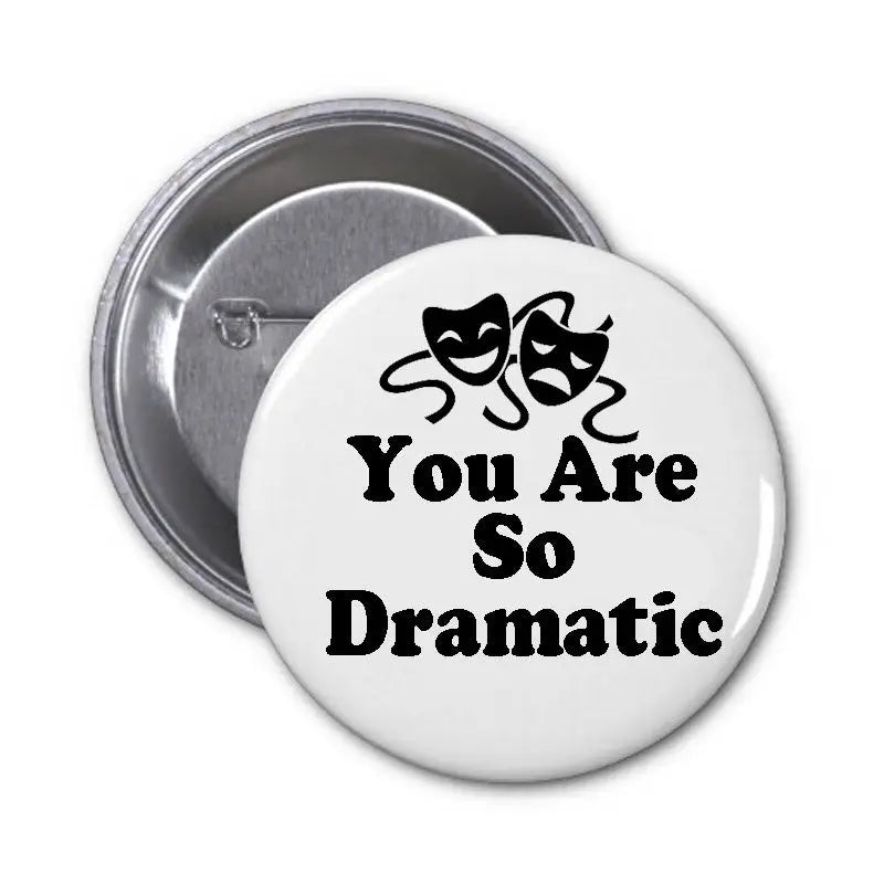 Round pinback button with white face and black “You Are So Dramatic” text