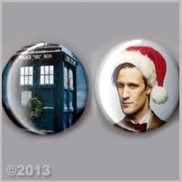 Round pinback badge set: blue building scene and Santa-style hat portrait, 1.25 in