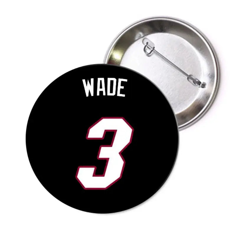 2.25-inch pinback button: black with WADE text and pink/white number 3