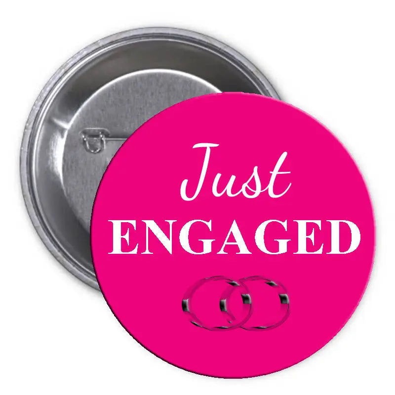 Pink pinback button with “Just Engaged” text and small heart graphic