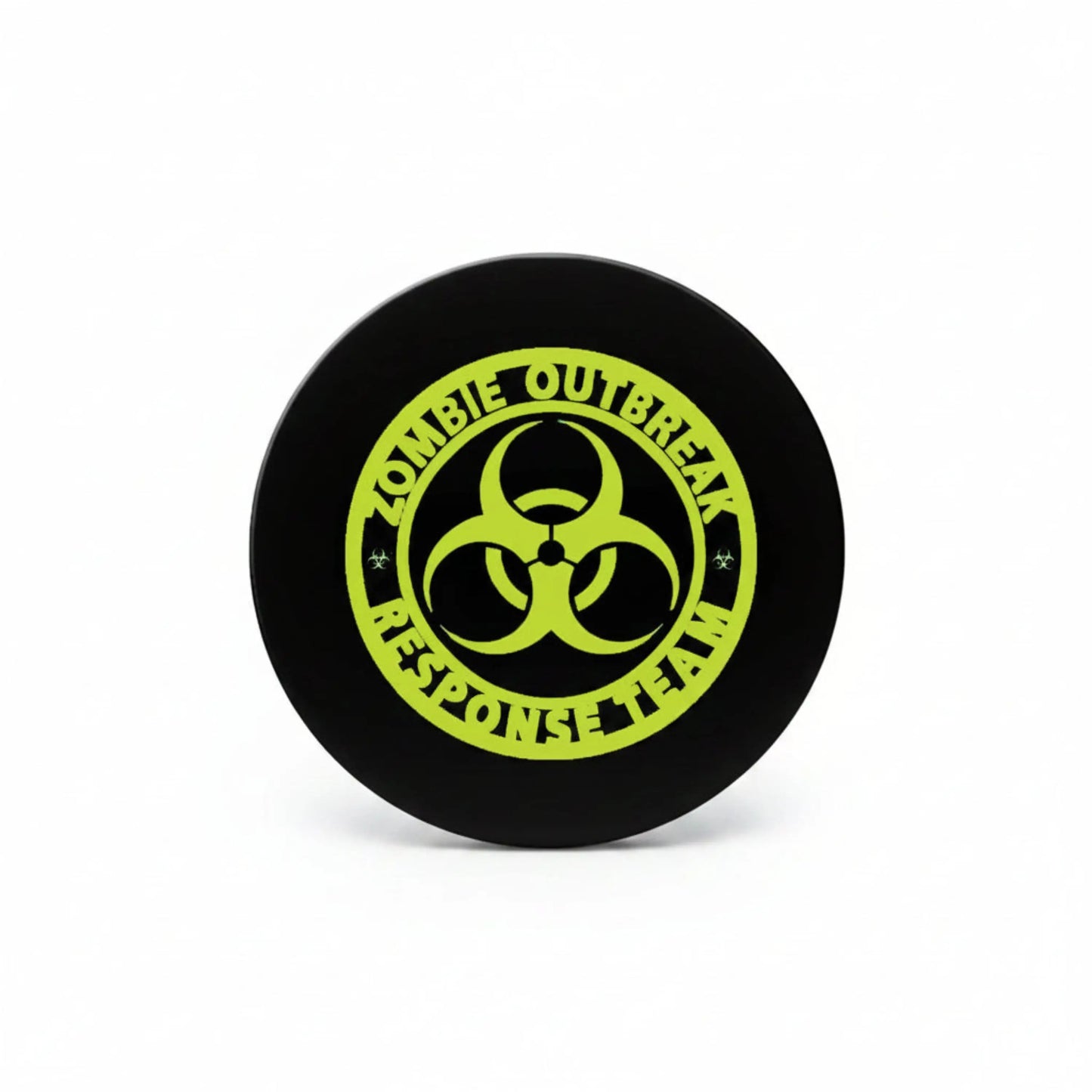 Round black pinback button with green biohazard symbol and ring of text