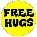Round yellow Free Hugs pinback button with bold black “FREE HUGS” text