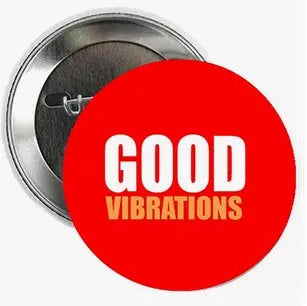 2.25-inch red pinback button with white 'GOOD VIBRATIONS' text, metal back visible