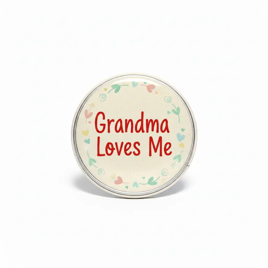 2.25-inch Grandma Loves Me pinback button, round with red text and floral border