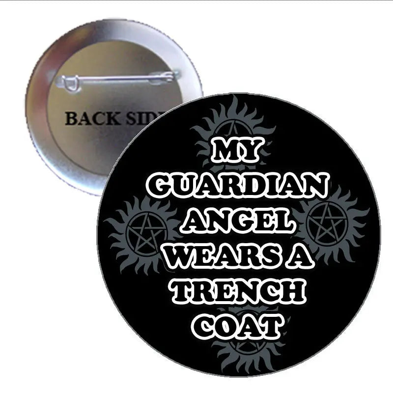 Black pinback button with white text: 'My Guardian Angel Wears a Trench Coat'