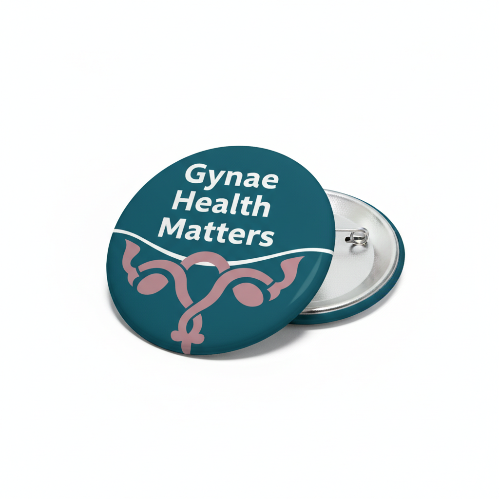 Round teal Pin Button badge with “Gynae Health Matters” text and medical icon, metal clasp back