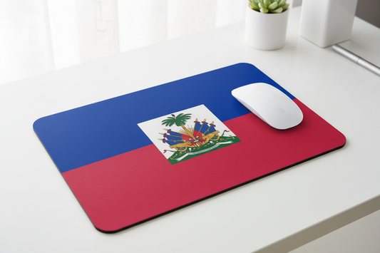Haiti flag mousepad on desk with computer mouse; blue top, red bottom, centered emblem