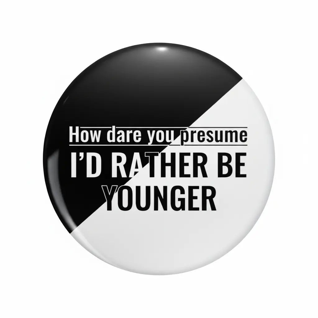 2.25-inch round pinback button with black and white halves and bold slogan text