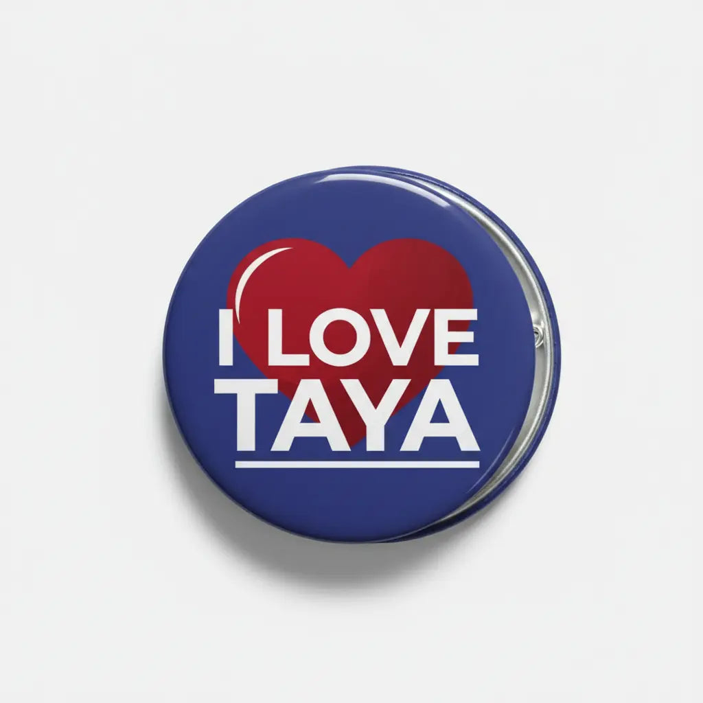 Blue round pinback brooch with red heart and 'LOVE TAYA' lettering