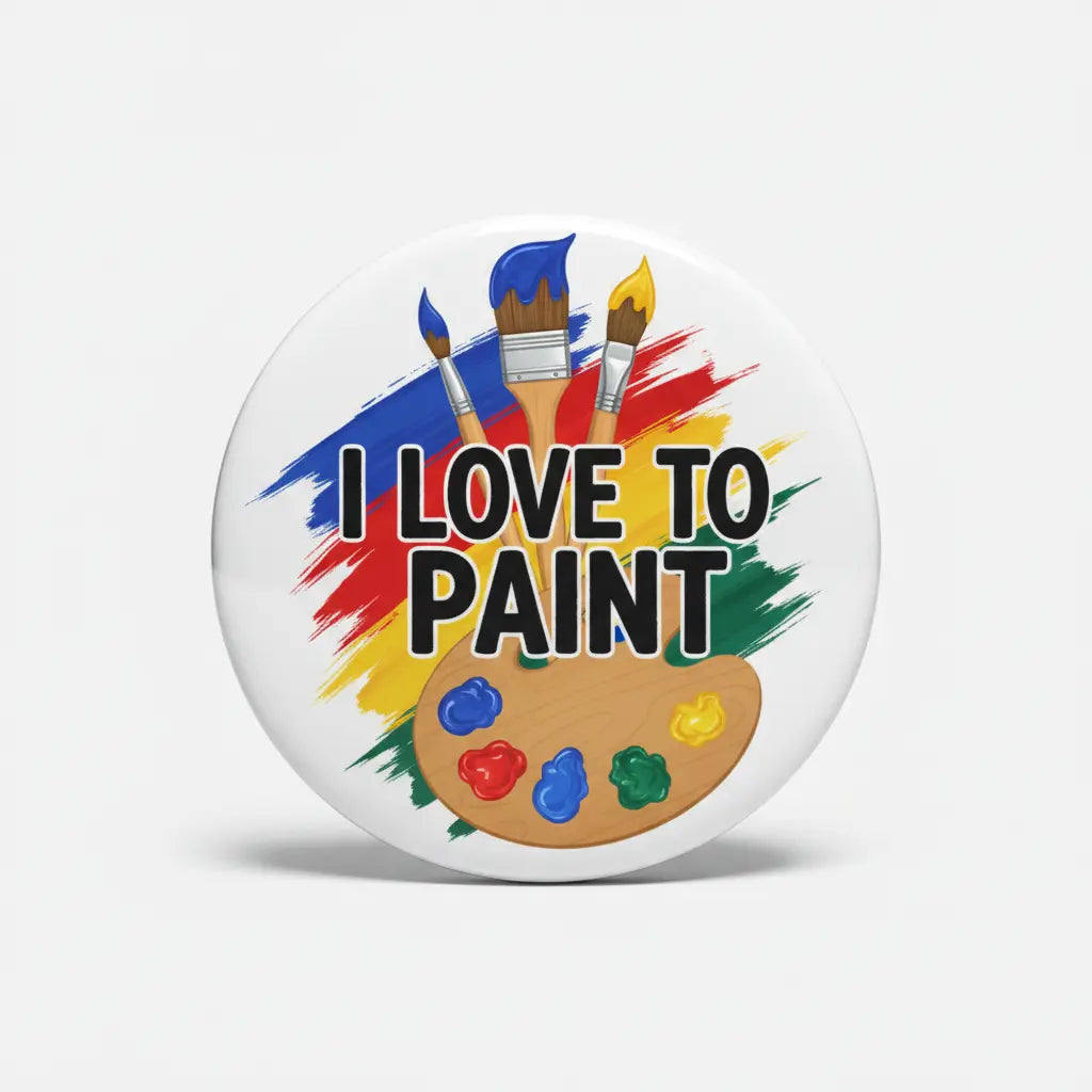 2.25-inch round pinback button with "I Love To Paint" text, paint palette and brushes