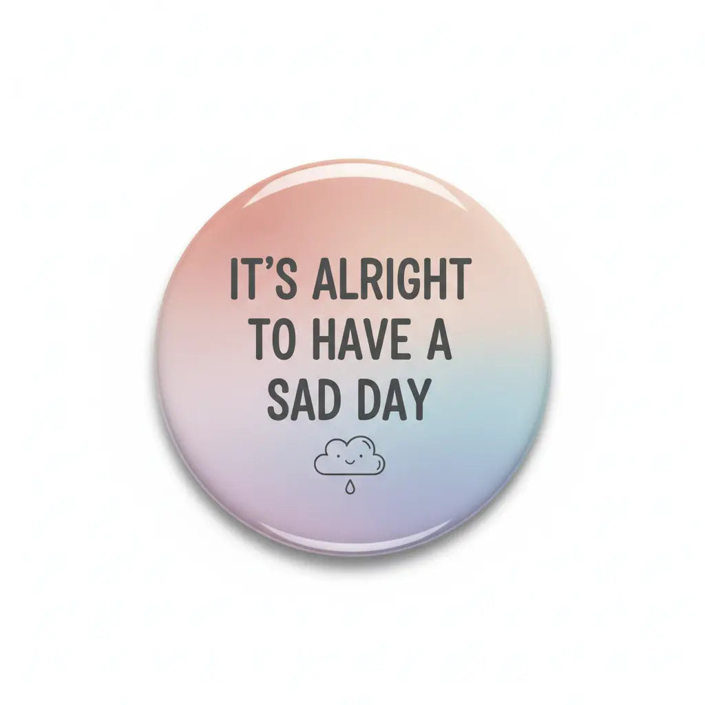 2.25-inch pinback button with “It’s Alright to Have a Sad Day” and cloud icon