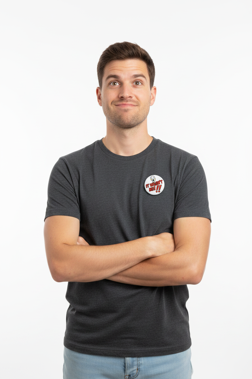 Pinback button pinned to a charcoal gray T-shirt chest