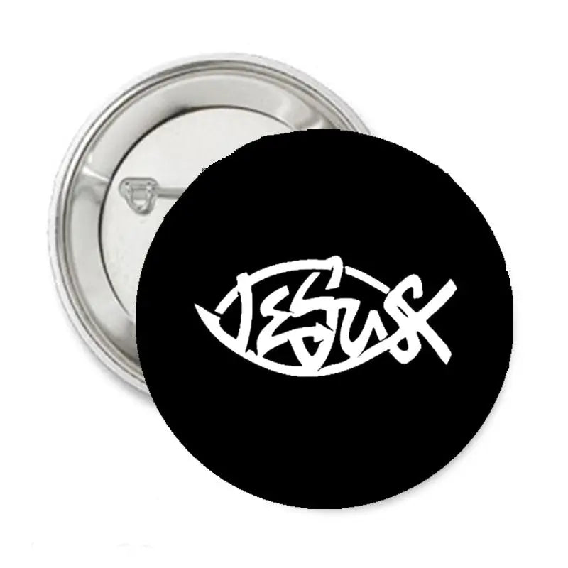 Jesus symbol pinback button, black round with white graphic and metal back