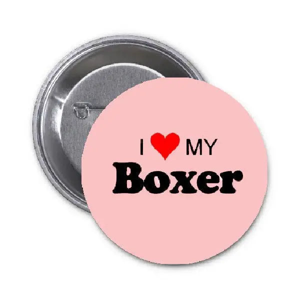 Round pink pinback button with black text: I ♥ MY Boxer