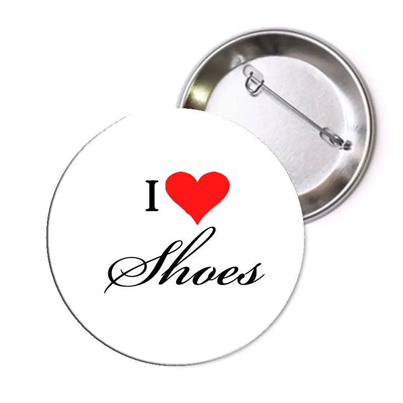 1.25-inch round silver pinback button: “I ♥ Shoes”