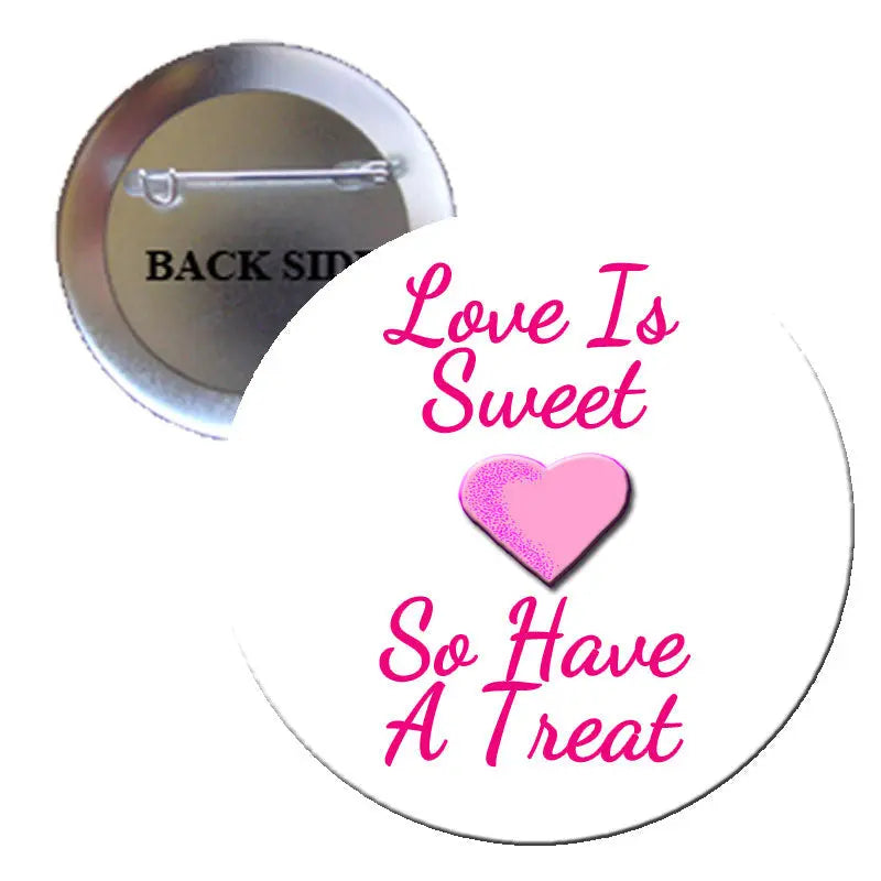 Round pinback button with 'Love Is Sweet So Have A Treat' and pink heart