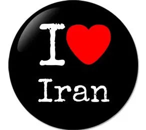 Black circular pinback button with red heart and white I Love Iran lettering