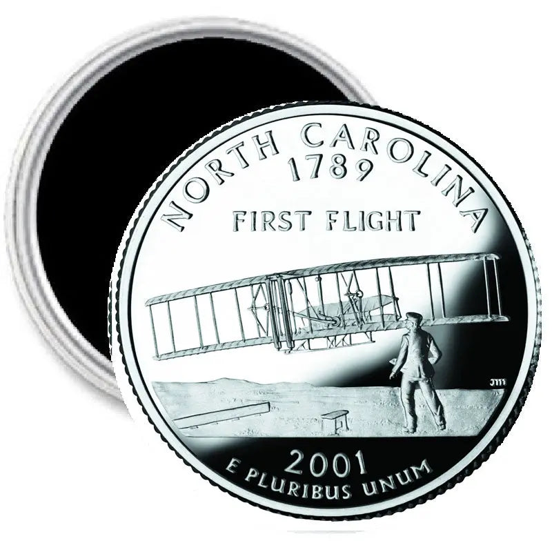 Round North Carolina quarter-style magnet with 2001 First Flight design and airplane