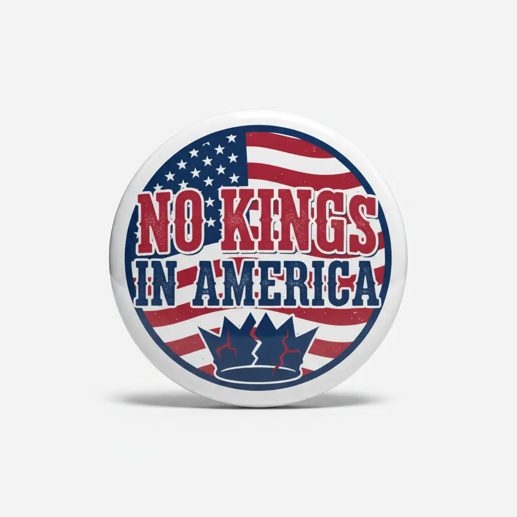 Round pinback button with USA flag design and 'NO KINGS IN AMERICA' text