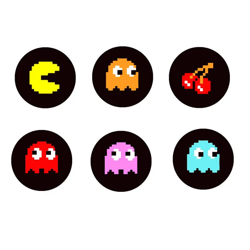 Set of six round pinback buttons with pixel-art Pac-Man ghosts in assorted colors