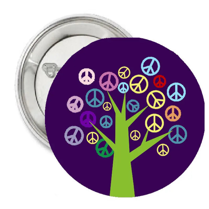 1.25-inch pinback button featuring a peace-sign tree with purple background and green trunk