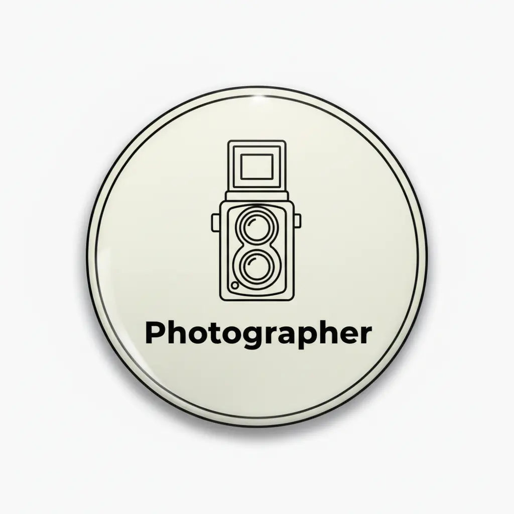 Round pinback button with camera icon and 'Photographer' text, 2.25-inch