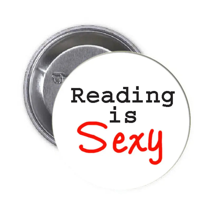 Round pinback button with white face text “Reading is” and red “Sexy”