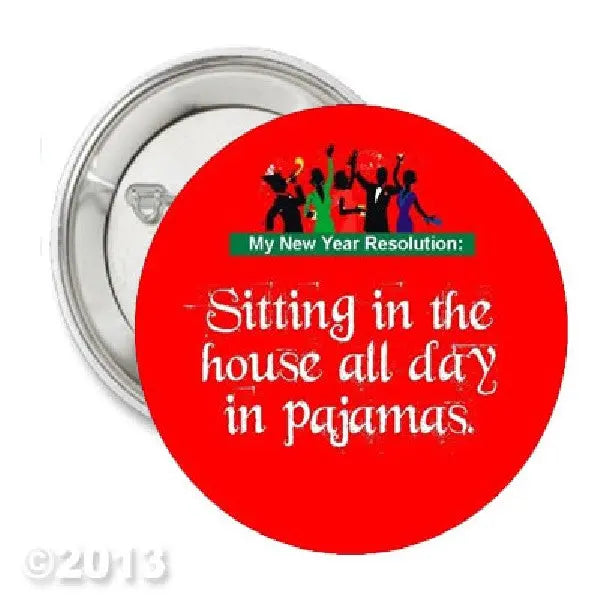 Red pinback button with slogan text and silhouette figures, 2.25-inch round