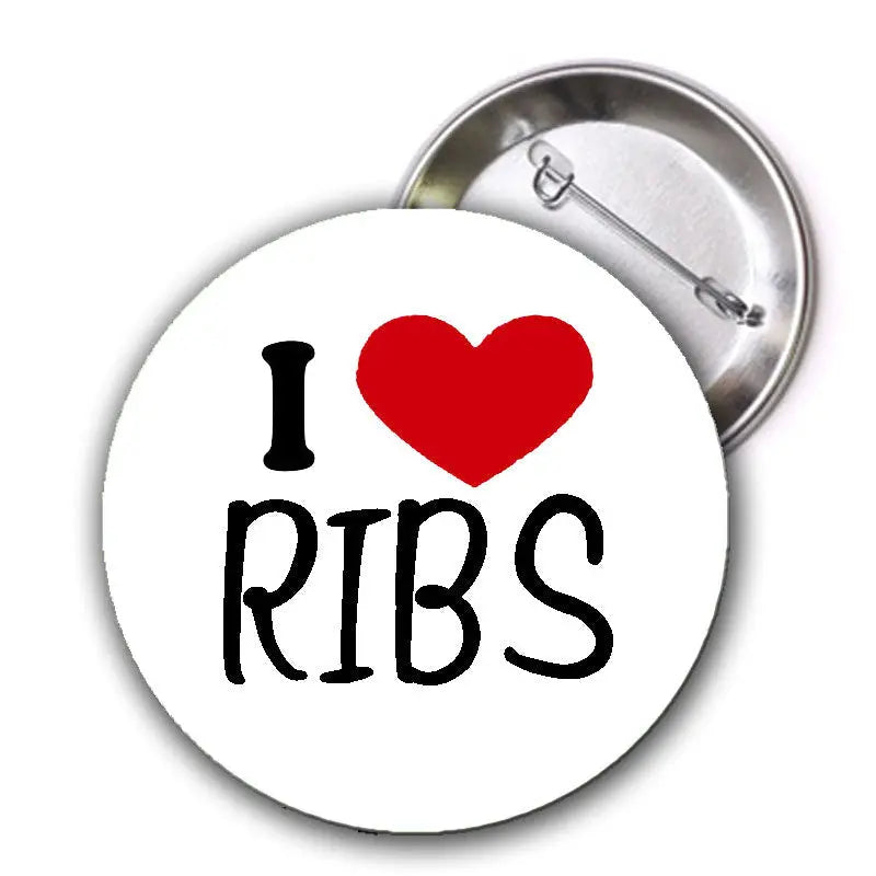 2.25-inch pinback button: 'I ♥ RIBS' with red heart, visible metal backing