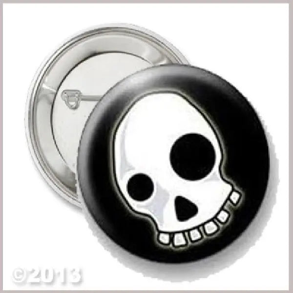 Round skull button pinback with black rim and white skull face, metal pin back.