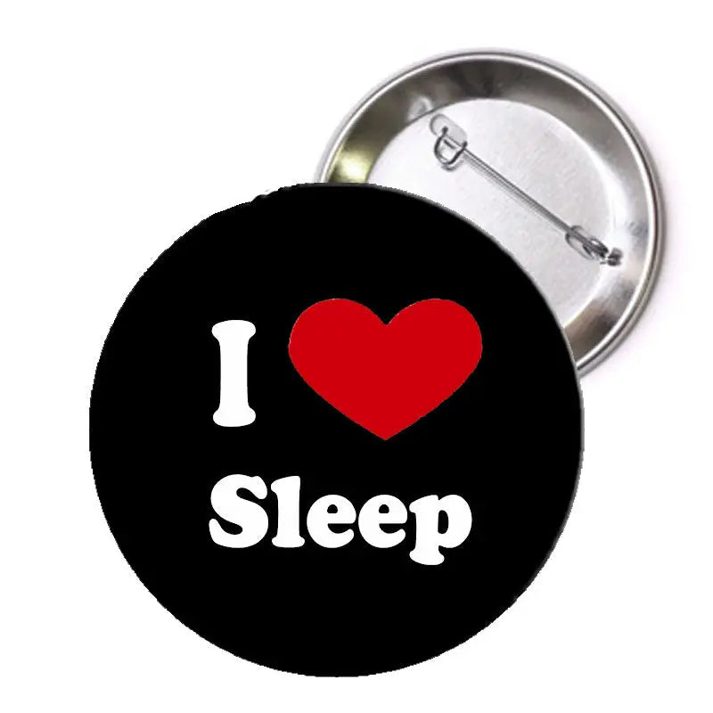 Round sleep pinback button: black with red heart and white "I" and "Sleep"