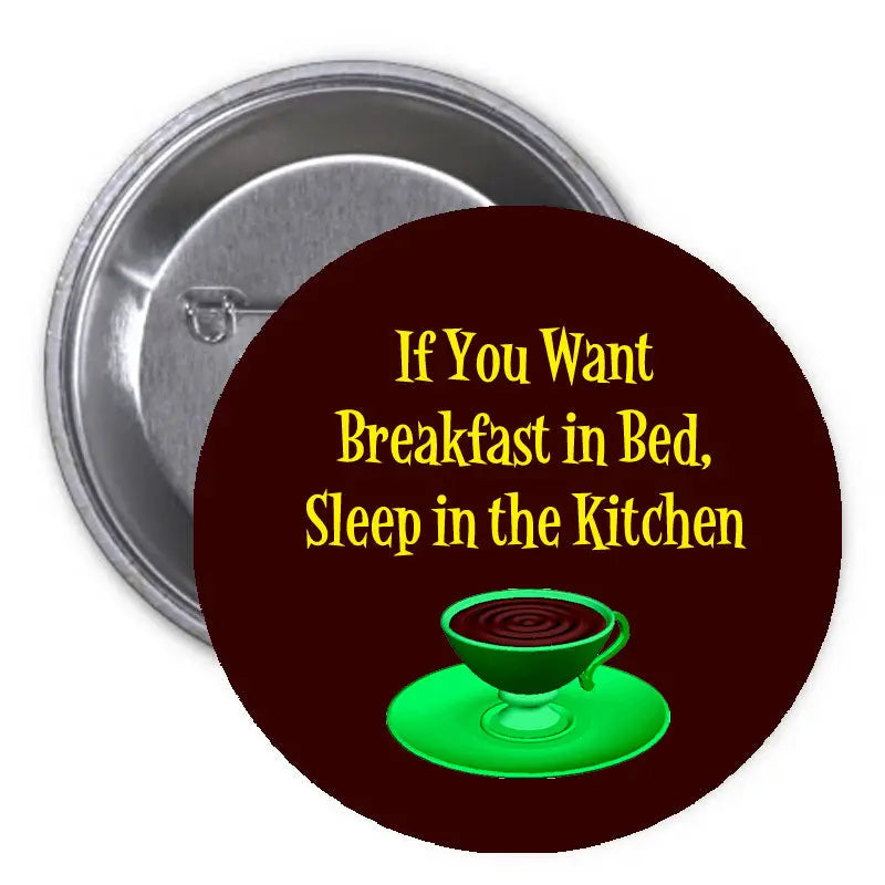 1.25-inch pinback button with maroon “Breakfast in Bed” text and green cup illustration