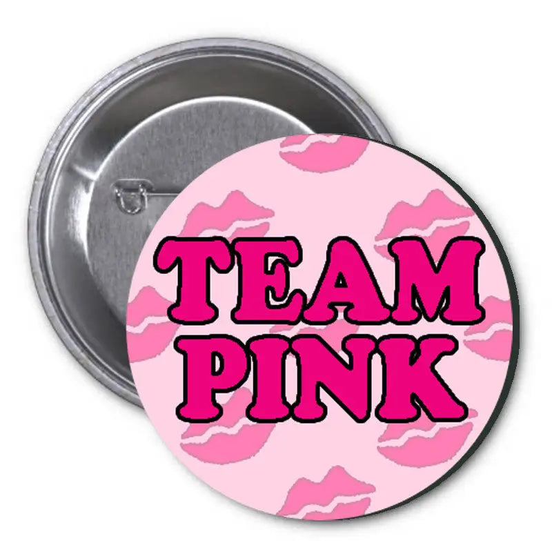 Round pink pinback button: 'TEAM PINK' text on camo pattern, 1.25-inch