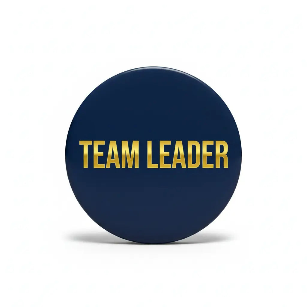 Team Leader 2.25-inch pinback button with navy circle and gold lettering