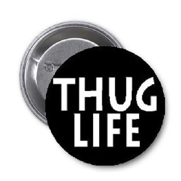 1.25-inch round pinback button with black face and white 'THUG LIFE' text.