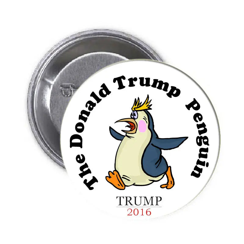 Round pinback button with cartoon penguin and 'Hey Donald Trump Penguin' text