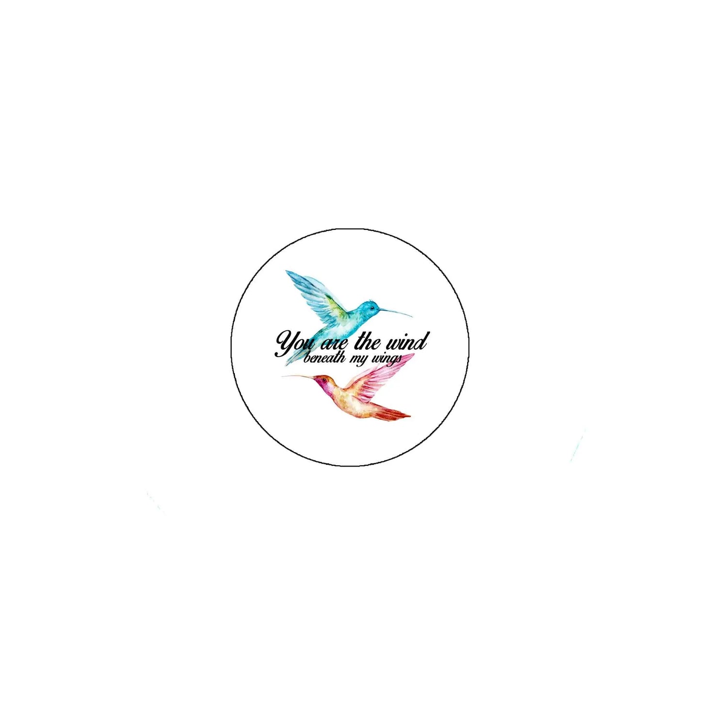 Round pinback button with bird illustration and 'wind beneath my wings' text