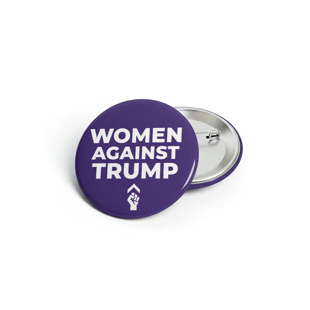 Purple pinback button with “WOMEN AGAINST TRUMP” text and metal clasp