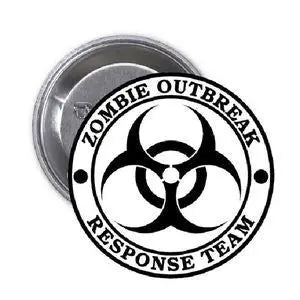 2.25-inch round metal pinback with silver edge and black biohazard graphic in a text circle