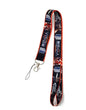 Anime-themed lanyard with red trim, swivel clasp and metal phone charm, black printed strap