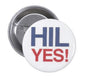 2.25-inch pinback button with 'HIL YES!' in blue and red on a white face