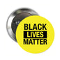 2.25-inch pinback button with yellow circle and black "BLACK LIVES MATTER" text
