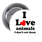 2.25-inch pinback button with "I Love Animals" text, red heart, metal back visible