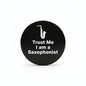 Black saxophonist pinback badge with white "Trust Me I am a Saxophonist" text