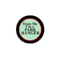 Round park ranger pinback badge with black rim and green center text "Trust Me I'm a Park Ranger"